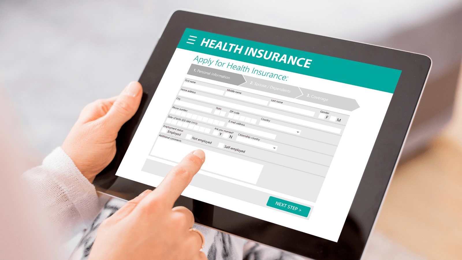A person uses a tablet to fill out an online health insurance application form, entering personal and employment details before selecting "Next Step.